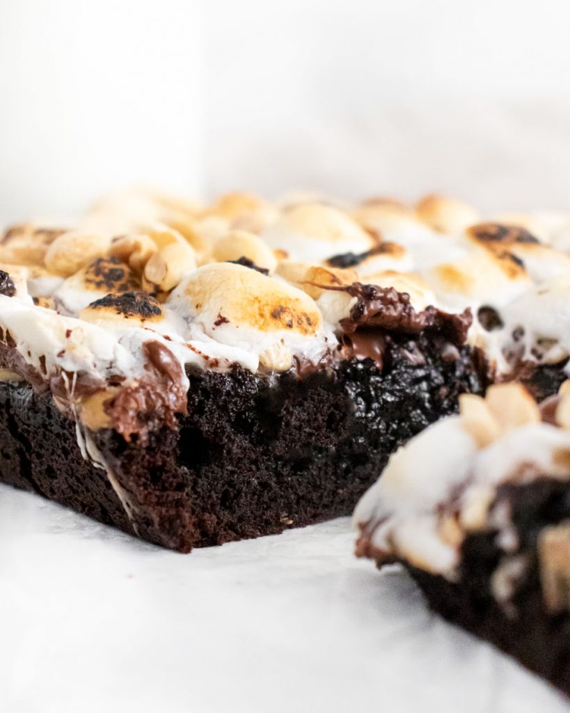 Close up showing gooey-ness of brownie. 